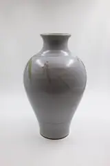 Peter Shearer, Large baluster vase, stoneware with painted leaves and berries design over a matt white ground