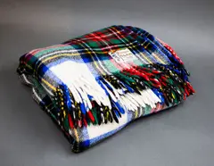 Kaiapoi Petone Group Textiles, Clan travel rug, with a Dress Stewart tartan pattern in red, green, blue, white, black and yellow