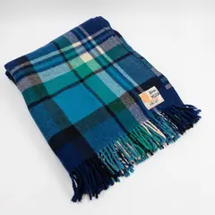 Kaiapoi Petone Group Textiles Ltd, Huia travel Rug, with a tartan design in different shades of blue, and white