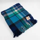 Kaiapoi Petone Group Textiles Ltd, Huia travel Rug, with a tartan design in different shades of blue, and white