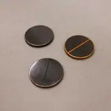 John Edgar, Coins of the New Realm, three coins made with argylite, copper and glass in artist's wooden case