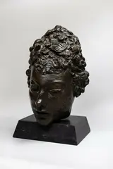 Jacob Epstein, Third Portrait of Meum (mask), cast bronze with a dark brown patina on a composite base, conceived in 1918
