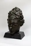 Jacob Epstein, Third Portrait of Meum (mask), cast bronze with a dark brown patina on a composite base, conceived in 1918