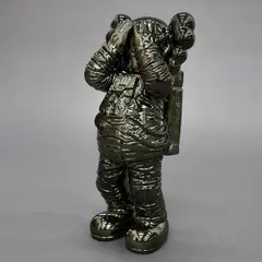 Holiday Space (black) by Kaws, polyurethane, offered Sep 2024