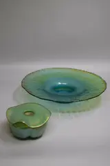 Mel Simpson, An art glass flared bowl and a small vase, of iridescent blue-green colour (small chip)