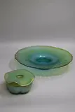 Mel Simpson, An art glass flared bowl and a small vase, of iridescent blue-green colour (small chip)