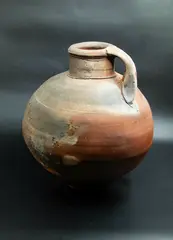 Large anagama flagon by Chester Nealie, wood-fired earthenware, partial textured finish with variable glaze effects in a gradation of browns and oranges, with s, offered Sep 2024