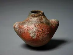 Stoneware vase by Theo Schoon and Len Castle, with umber glaze and sea shell fuming, 1999, offered Sep 2024