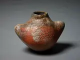 Theo Schoon and Len Castle, Stoneware vase, with umber glaze and sea shell fuming, 1999