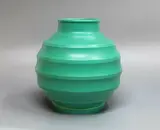 Matt green spherical vase by Keith Murray for Wedgwood, with lathe turned concave bands, offered Sep 2024