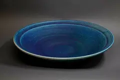 Large table bowl by Graeme Storm, stoneware with mottled blue and green barium glaze, sold Sep 2024