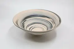 Agate ware bowl by John Parker, unglazed ceramic with straight flaring sides (tiny crack to the foot), sold Sep 2024