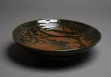 Len Castle, Large stoneware bowl, with tenmoku wax resist gestural decoration