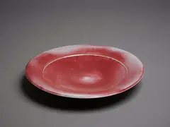 Greg Barron, Circular platter, with red flambé glaze with mushroom highlights