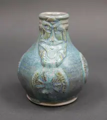 Small bellarmine jug by Graeme Storm, porcelain with pale blue rutile glaze, sold Sep 2024