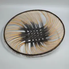 Ruth Castle, Large grid pattern round dish, fine dyed woven rattan