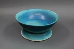 Fruit bowl by Graeme Storm, stoneware with mottled blue and green barium glaze, sold Sep 2024