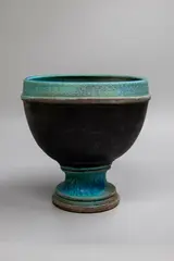 Footed bowl by Graeme Storm, stoneware, decorated with manganese glaze to the central band, light barium glaze to the foot, top rim and interior, sold Sep 2024
