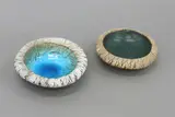 Two small Pacific series bowls by Len Castle, one in bright alkaline blue glaze, the other in dark matt green, sold Sep 2024