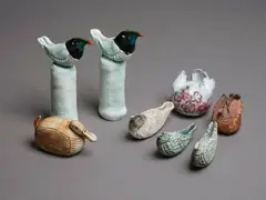 Rosemarie Brittain, Group of eight assorted ceramic birds, comprising a pair of toucans, a duck, two rounded winged birds and three smaller ones (small losses)