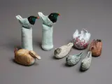 Rosemarie Brittain, Group of eight assorted ceramic birds, comprising a pair of toucans, a duck, two rounded winged birds and three smaller ones (small losses)