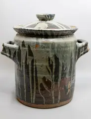 Large lidded crock by Potter Unknown, stoneware with light jun glaze over tenmoku, sold Sep 2024