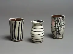 Three Vases by Martin Poppelwell, glazed earthenware, sold Aug 2024