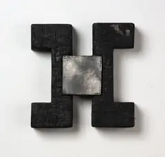 Julia Morison, Codex II, lead and ash on shaped timber