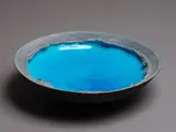 Crater Lake bowl by Len Castle, matt light grey stained earthenware, alkaline blue glaze to the interior (minor chipping), sold May 2024