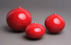 Three red orb vases by Graham Ambrose, impressed potter's mark to the bases, sold May 2024