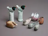 Rosemarie Brittain, Group of eight assorted ceramic birds, comprising a pair of toucans, a duck, two rounded winged birds and three smaller ones (AF)