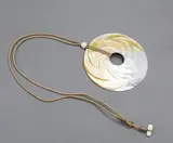 Steve Myhre, Round mother-of-pearl pendant, carved & polished mother-of-pearl pendant on cord necklace