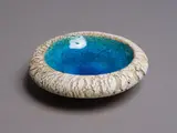 Small Pacific Series bowl by Len Castle, stoneware with alkaline blue glaze to the interior and silica rubbed exterior, sold May 2024