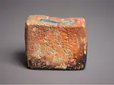 Rare small slab vase by Len Castle, with heavily crackled glaze and textured surface, with natural patina and flaking, blue unglazed interior, sold May 2024
