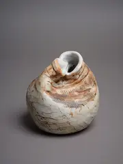Rosemarie Brittain, Double aperture vase, ceramic of deliberately altered form with amber matte glaze and textural effects