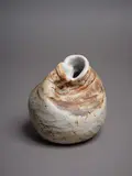 Rosemarie Brittain, Double aperture vase, ceramic of deliberately altered form with amber matte glaze and textural effects