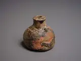 Small bottle by Chester Nealie, wood fired stoneware, with small lug handle, sold May 2024
