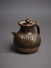 Barry Ball, Teapot, ceramic with a gradation of brown glazes contrasting with unglazed natural base (repaired handle)