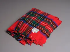 Kaiapoi Textiles Ltd, Clan travel rug, with a Royal Stewart tartan pattern in red, green, blue, black, yellow and white