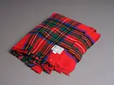 Kaiapoi Textiles Ltd, Clan travel rug, with a Royal Stewart tartan pattern in red, green, blue, black, yellow and white