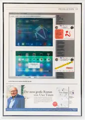 Simon Denny, Nsa Slide Redesign Proposal (Faz) (2013), photographic print from a newspaper scan in perspex case