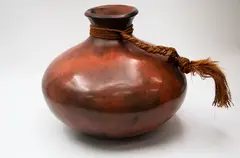 Robyn Stewart, Large jar, dung-fired and burnished ceramic with polished orange-brown surface, rope handle (chip to rim)