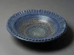 Mirek Smisek, Large and impressive pedestal bowl, stoneware with salt glaze in blue, green and brown tones, applied petal decoration to the rim, metal hanging fittings to the foot