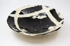 Campbell Hegan, Large footed bowl, glazed porcelain decorated with abstract design in black and white and with red details