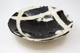 Campbell Hegan, Large footed bowl, glazed porcelain decorated with abstract design in black and white and with red details