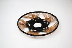 Small five-pointed star round dish by Ruth Castle, fine woven rattan, sold Feb 2024