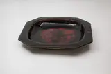 Octagonal platter by Len Castle, stoneware with red copper effects on tenmoku glaze, sold Feb 2024