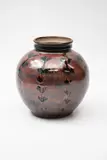 Graeme Storm, Stoneware vase, decorated with wax resist stilised floral design over tenmoku glaze