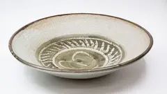 Doreen Blumhardt, Early large stoneware bowl, decorated with an abstract green-grey wax resist pattern on an oatmeal ground