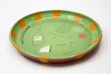 Steve Fullmer, Neudorf Vineyards dish, glazed terracotta decorated with incised and painted design on a bright green ground
